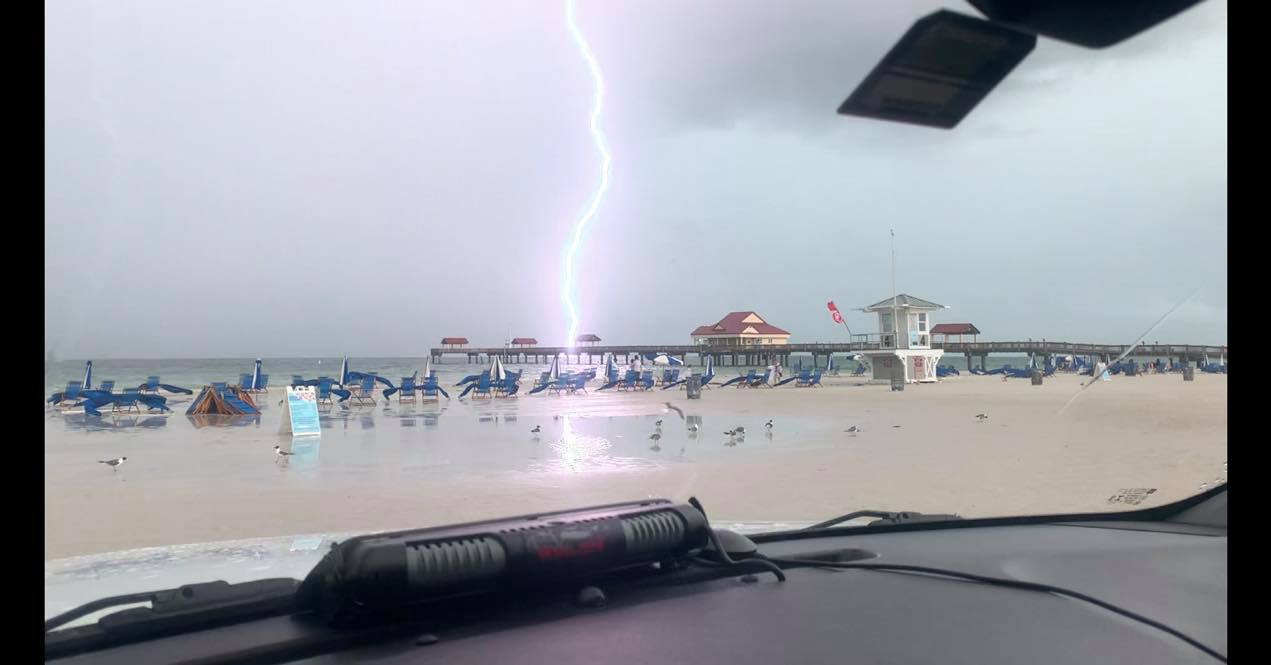 Police dashcam captures shocking lightning strikes over Pier 60