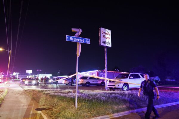 Man breaking into cars at tulsa bar charged with murder after shooting - photo licensed by shore news network.