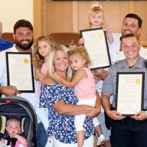 Police officer recognized for saving life of motorcyclist who lost leg - photo licensed by shore news network.