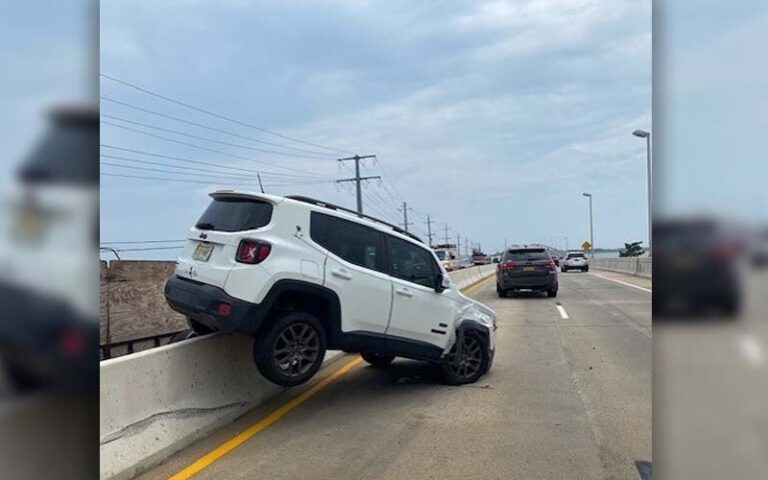 Teen crashes truck on long beach island causeway bridge - photo licensed by shore news network.