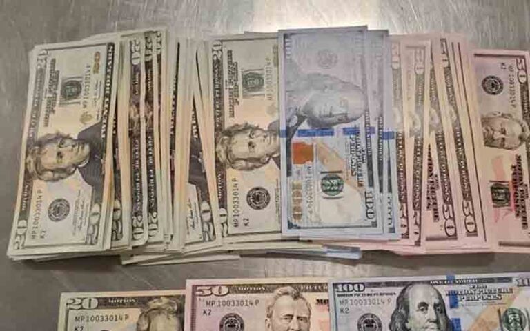 Illinois woman admits to counterfeit charge - photo licensed by shore news network.