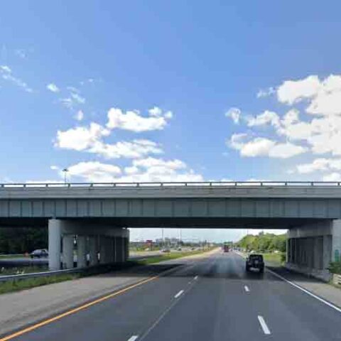 Dad shot on i-70 with baby in back seat - photo licensed by shore news network.