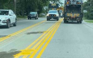 What's with all the yellow lines on erie county roads?