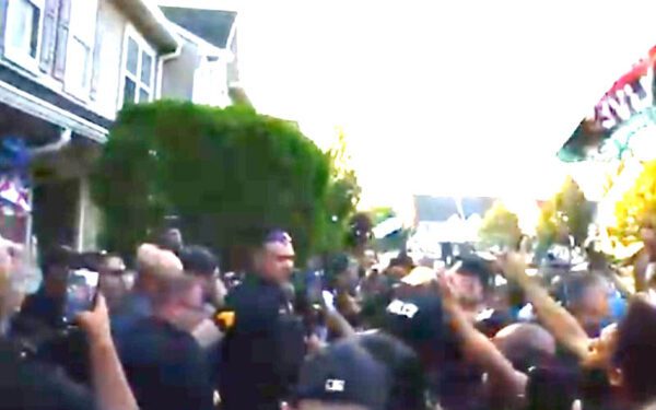 Burlington prosecutor says arrests likely after mob pelts officers during the arrest of alleged racist