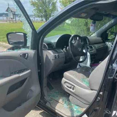 Cop rescues child from locked car then helps pay for breaking the window - photo licensed by shore news network.