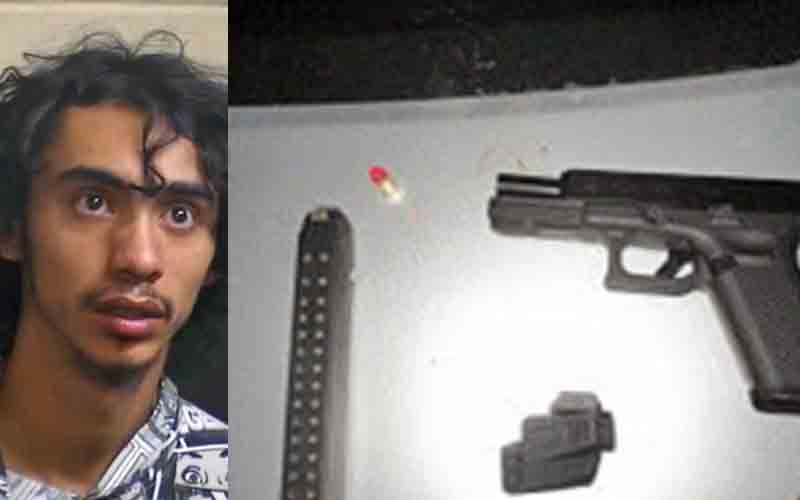 Suspect charged during traffic stop after officers find two loaded, stolen guns