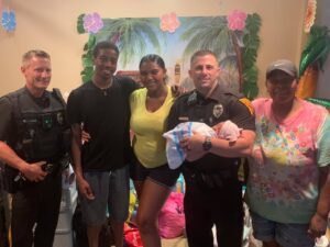 Evesham police officers visit baby after helping mom with delivery