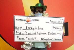 Retired high school teacher wins $50,000 jackpot at ticket bought at baltimore grocery store