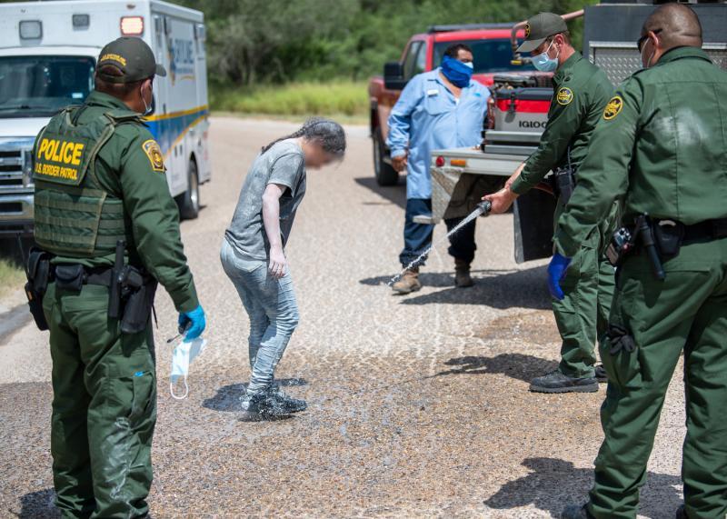 Dangerous new border crossing tactic: Migrants hiding in railcars, buried in powdered clay