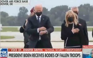 Fact check: did joe biden check the time as caskets of dead marines passed by?