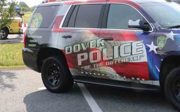 Dover police department investigating claims of officers asleep in their patrol car - photo licensed by shore news network.