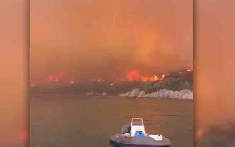 Huge fire rips through a Mediterranean tourist spot, killing 8