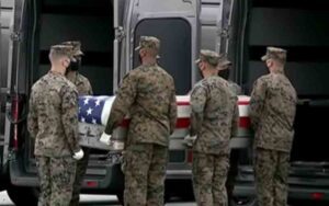 Governor murphy declares "new jersey football week" after bodies of slain troops return home