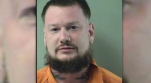 Man pulls gun in road rage after being honked at for making illegal turn