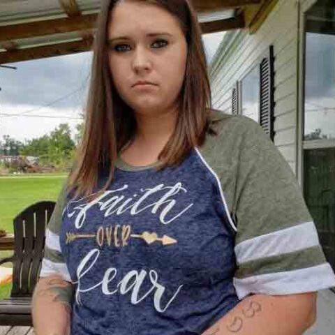 Woman charged for violently shaking crying baby demanding somebody "shut the child up" - photo licensed by shore news network.