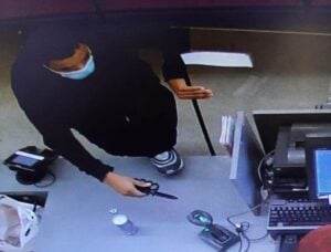 Police searching suspect who robber big lots clerk while giving change