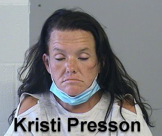 Woman caught breaking into cars at Tulsa car dealership
