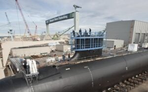 France wants australia to pay up for its secret nuclear submarine deal with us, uk