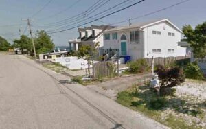 Fire destroys brick township home, damages another