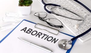 Madison county man sentenced to prison for making online threats to kill individuals connected with abortion services non-profit