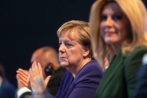 Angela merkel’s party suffers worst performance ever as chancellor prepares to end 16 years in office