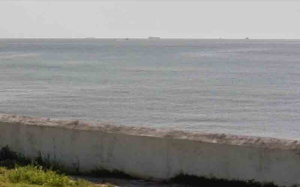 Four rescued from capsized sailboat off the coast of spring lake - photo licensed by shore news network.