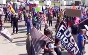 Ida-no: biden met by hundreds of trump supporters in gem state