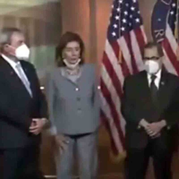 Nancy pelosi breaks her own congressional face mask mandate - photo licensed by shore news network.