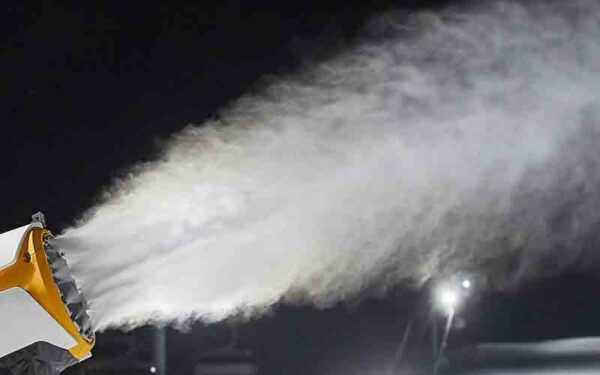 Lake tahoe resort owner using snow machines to keep encroaching caldor fire at bay - photo licensed by shore news network.