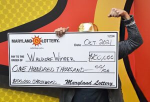 Waldorf father-son team are $100,000 richer after winning scratch-off