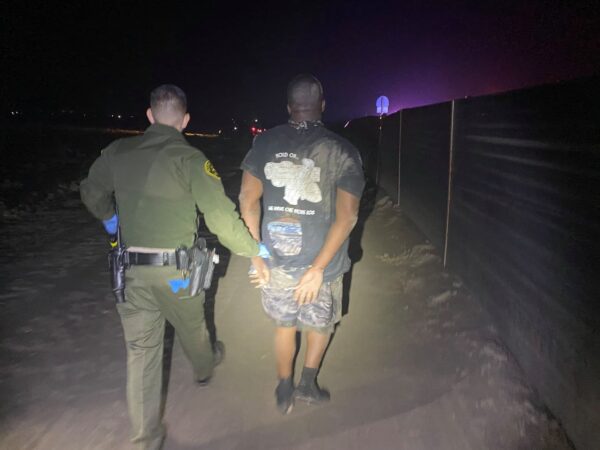 Suspect stole car as victim was unloading groceries, arrested