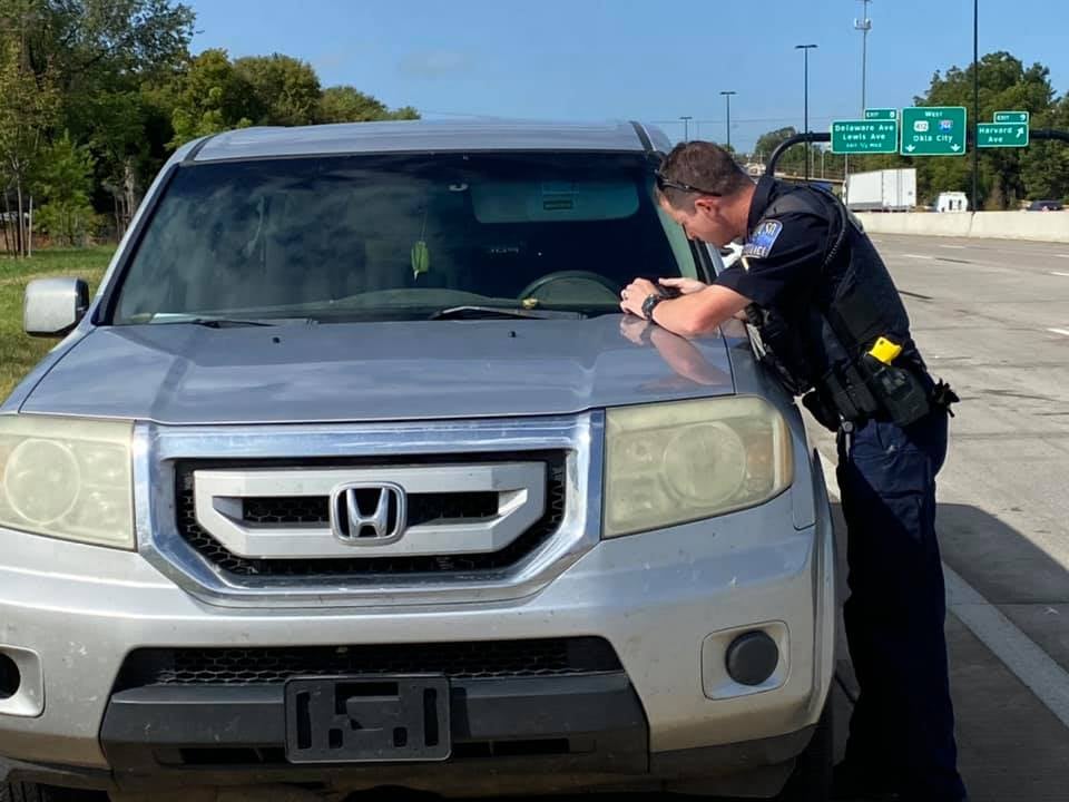 Woman shot while driving on I-244 near Yale