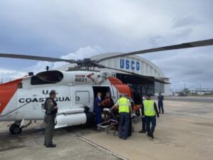 Coast guard helicopter rescues swimmers off rompe olas beach