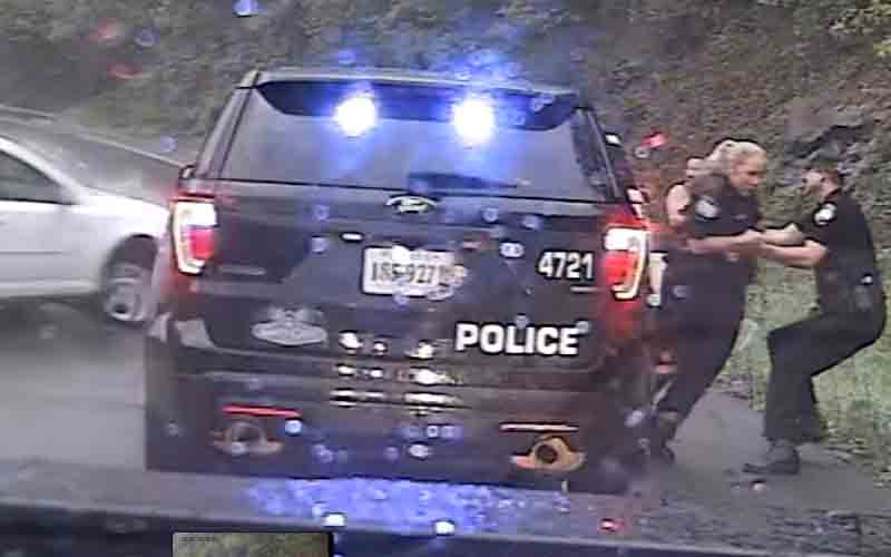 Watch: Cop saves female partner milliseconds before crash