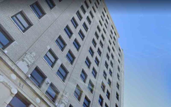 Man survives 15-story fall from Jersey City hi-rise, lands on BMW