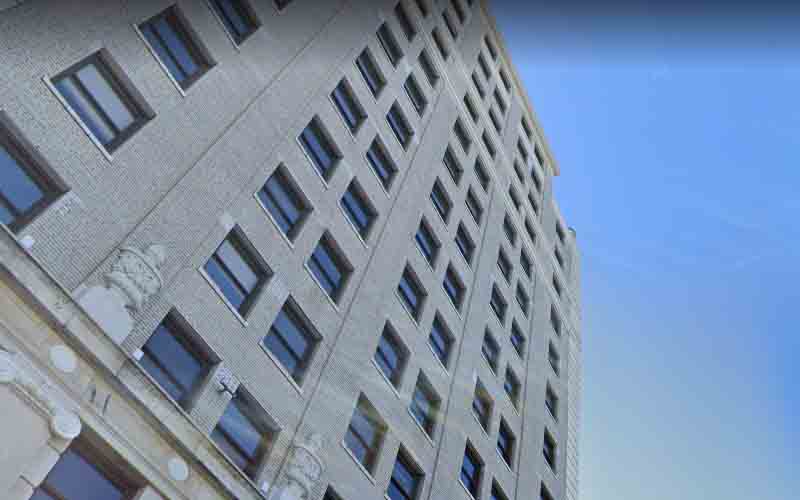 Man survives 15-story fall from Jersey City hi-rise, lands on BMW
