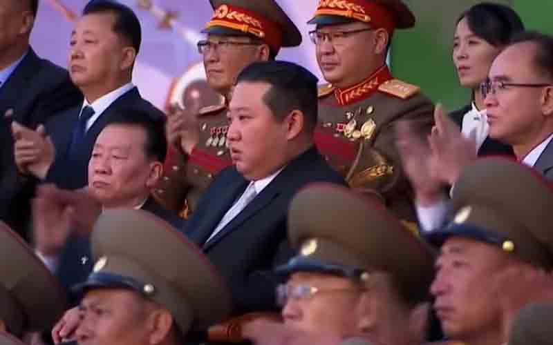 North Korean Military Puts On Bizarre Stunts Alongside Nuclear Missile Exhibition
