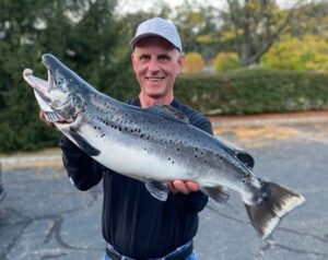 New jersey fisherman catches record-breaking salmon
