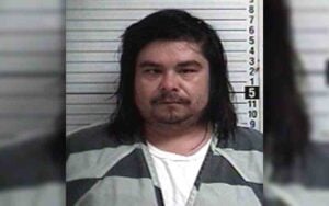 Man charged after dragging woman from vehicle while she tried to flee