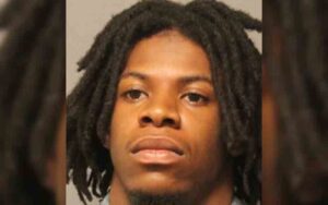 Driver involved in crashed charged for illegal gun possession