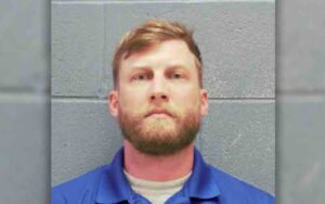 Lee count man charged after beating, stabbing dog