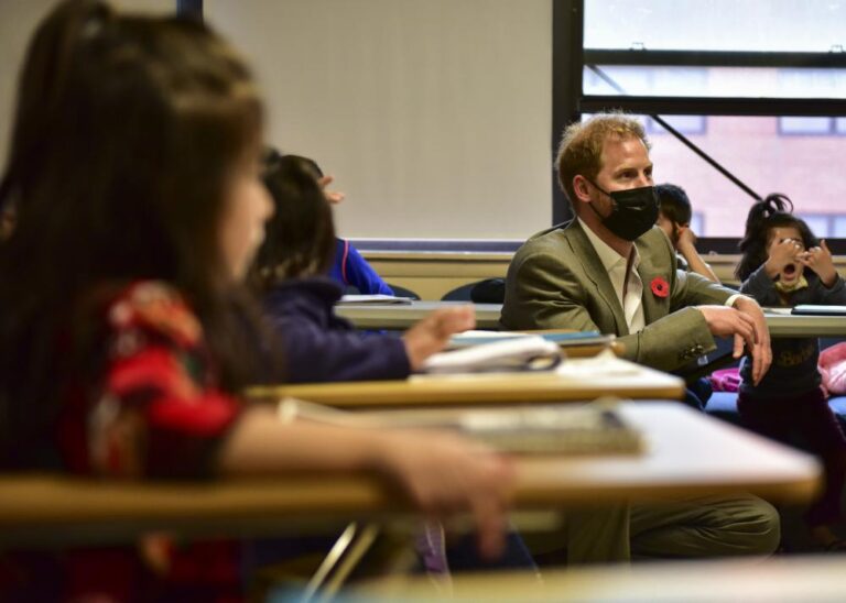 In new jersey, refugee school children photographed unmasked while public school students masked - photo licensed by shore news network.