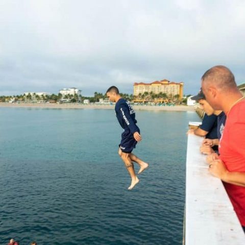 Probationary firefighters face their fears, build confidence in pier jump - photo licensed by shore news network.