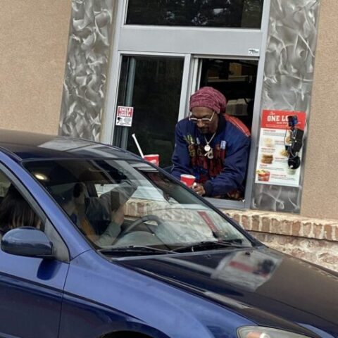 Nothing to see here except for snoop dogg serving fried chicken at the drive-thru window - photo licensed by shore news network.