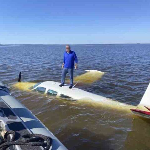 Pilot rescued after plan crashed off cedar key - photo licensed by shore news network.