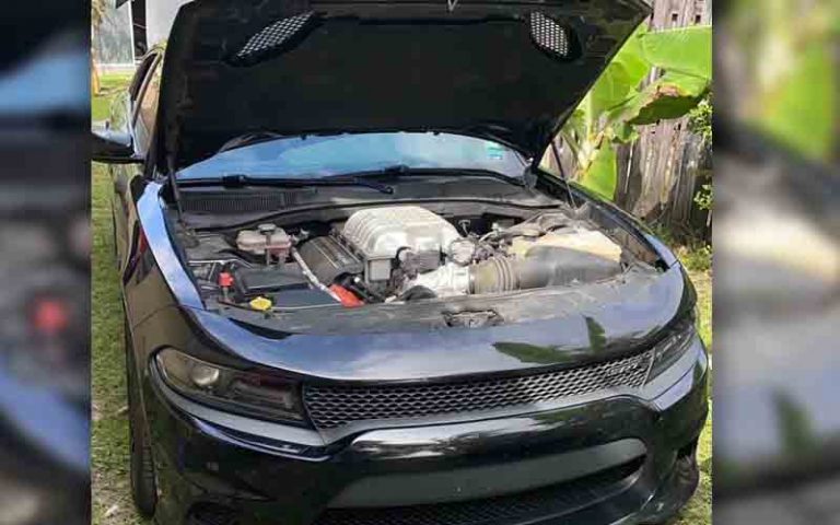 Off duty deputy suspicious after seeing what was under the hood in the neighborhood - photo licensed by shore news network.