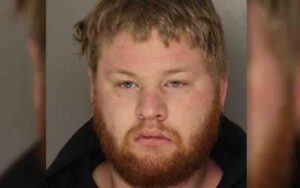 Suspect charged for july beating, murder