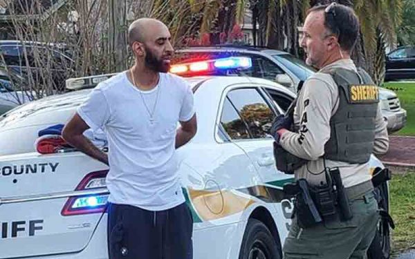 Man charged after nearly striking officer during getaway
