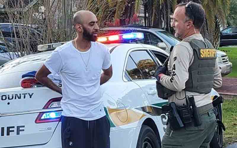 Man charged after nearly striking officer during getaway