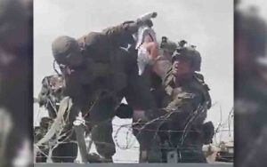 The baby handed to us forces during kabul chaos is missing, family says